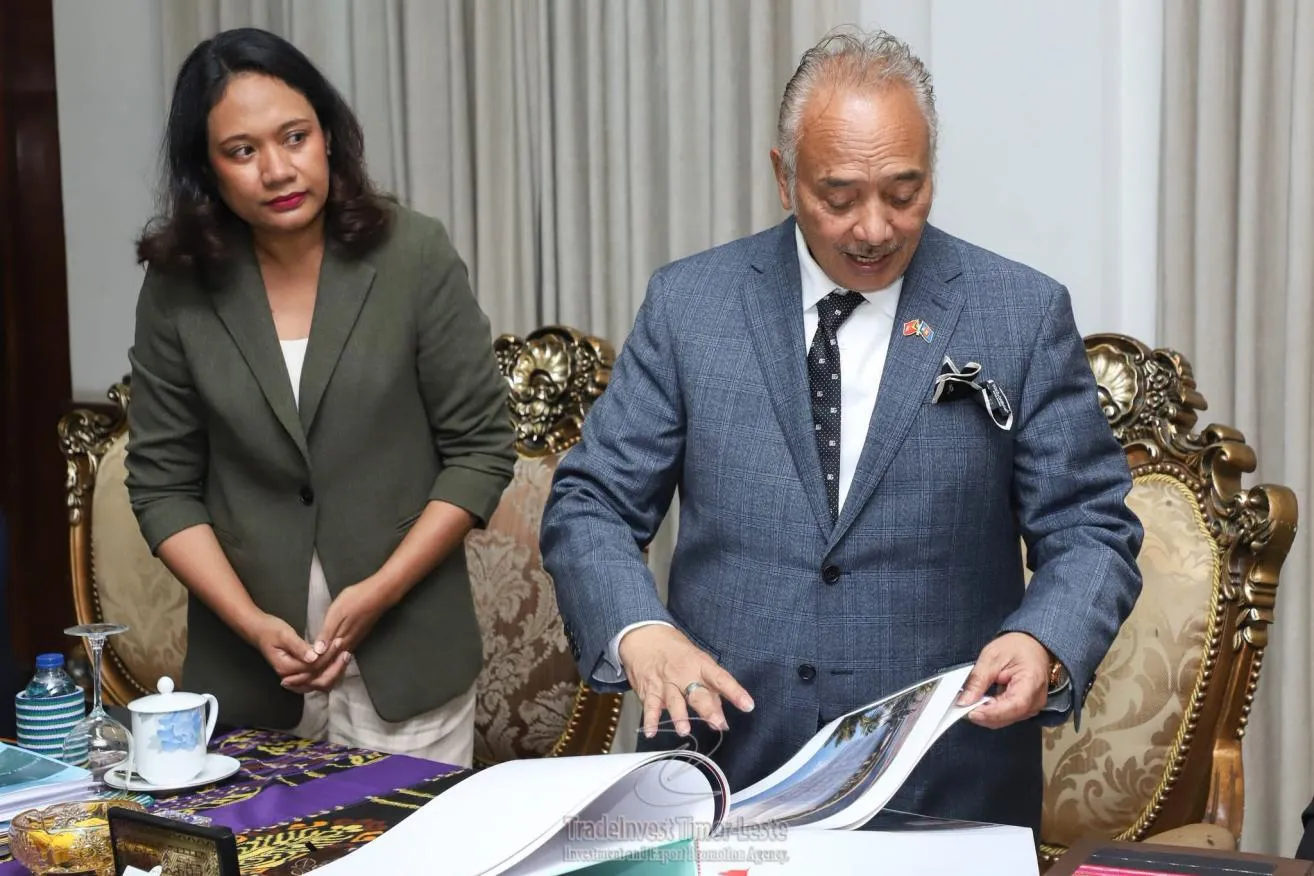 Review of project materials during the Declaration of Benefit certificate presentation