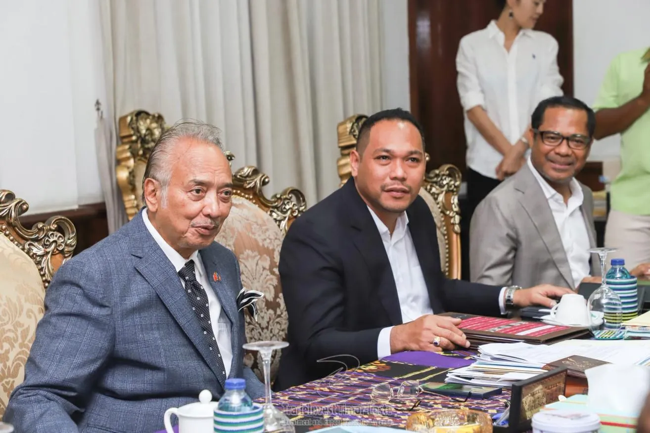 Officials and project representatives meeting in Dili