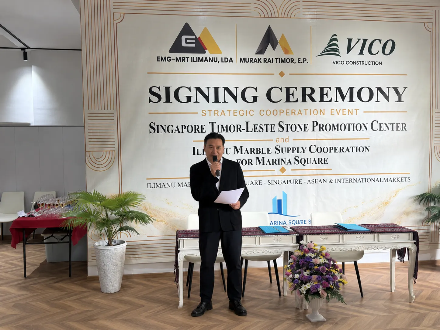 Victor Lei speaking at the signing ceremony